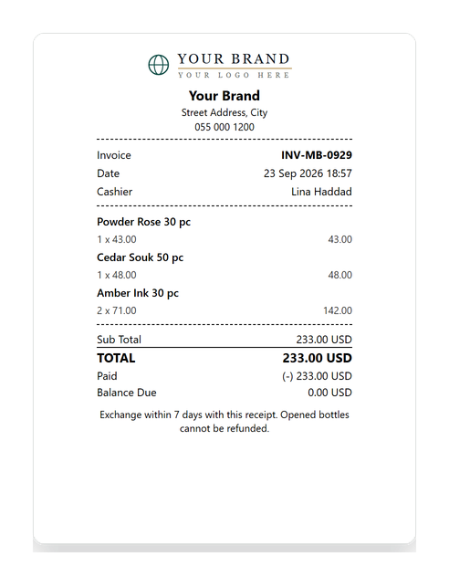 An eighty-millimetre receipt with the shop's wordmark, the invoice number, the cashier, three items, the total paid and the exchange policy.